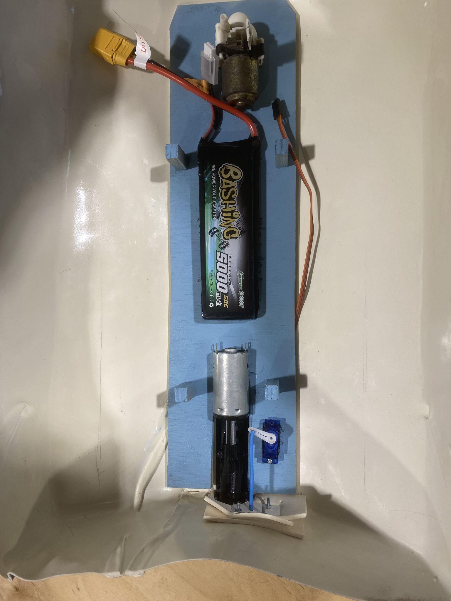 Electronics bay with battery and motor